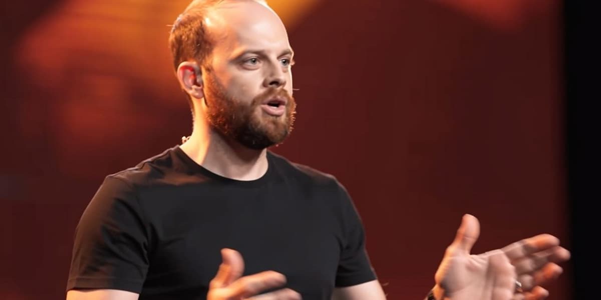 RankScore founder Sam Frost speaking at a marketing conference in New York