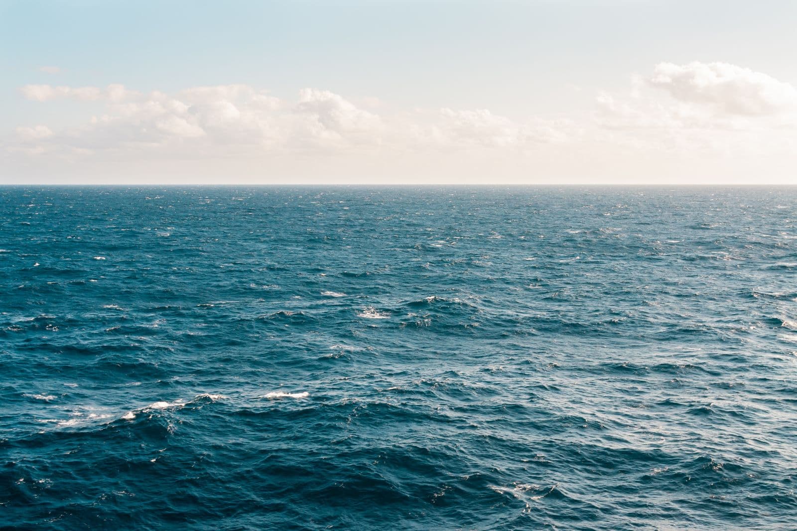 Open blue water under a bright sky