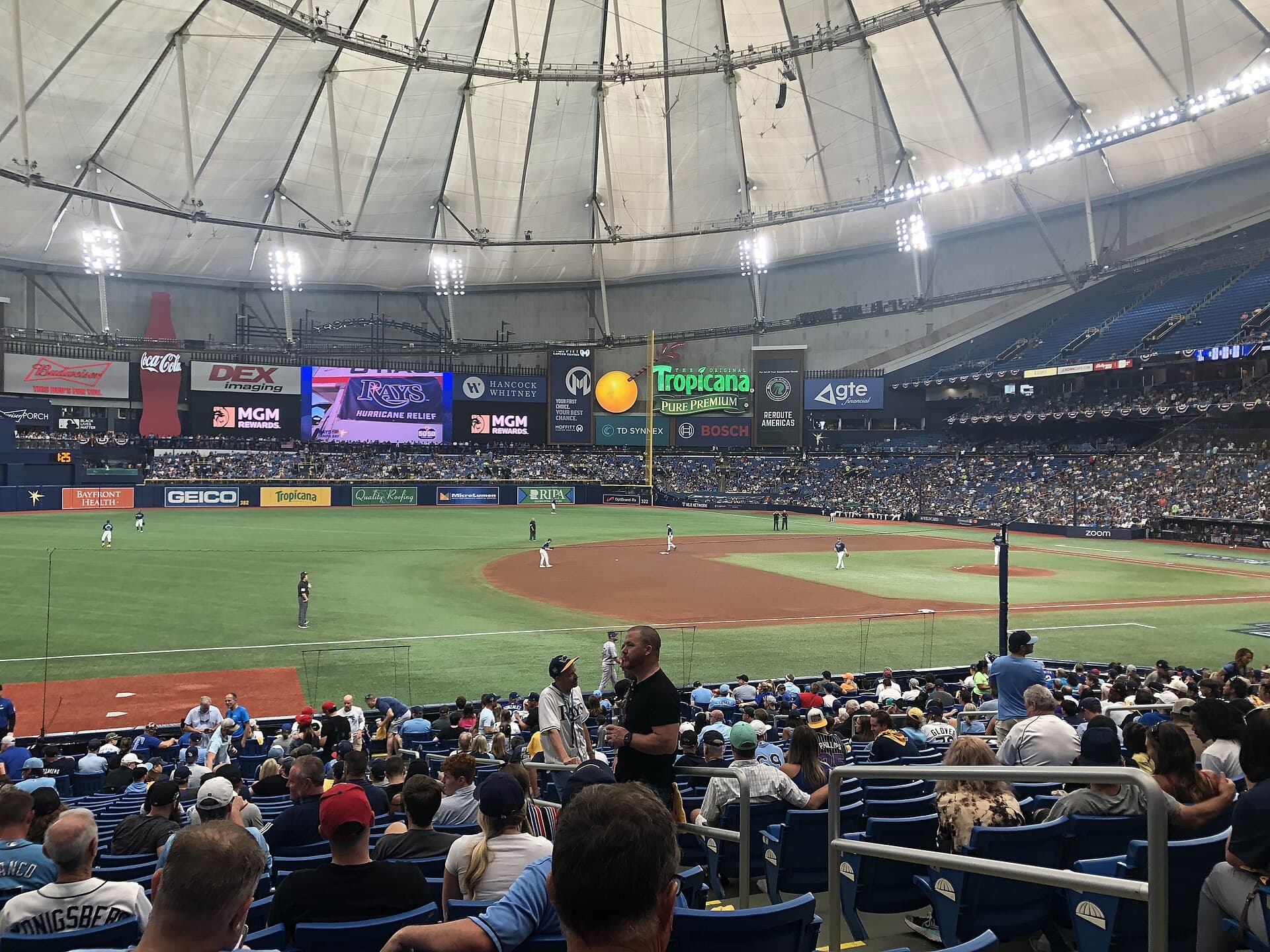 Fans in the stands at Tropicana Field during a Rays postseason game under the dome